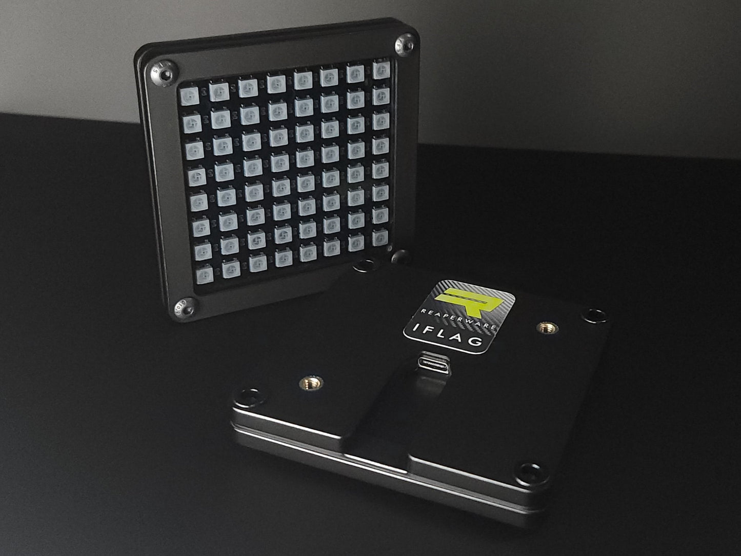ReaperWare iFlag 8x8 RGB LED matrix gear and flag indicator display panel for SimHub telemetry tracking mounted on a PC racing simulator chassis.