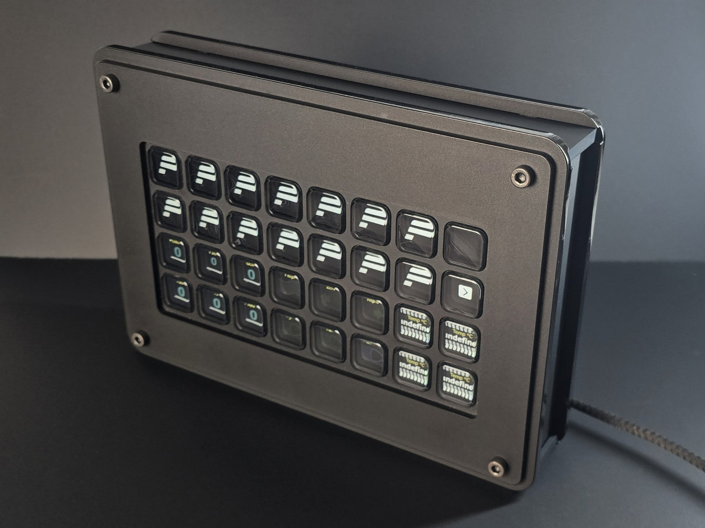 A stream deck enclosure designed for sim racing rigs