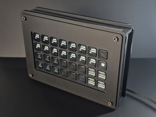 A stream deck enclosure designed for sim racing rigs